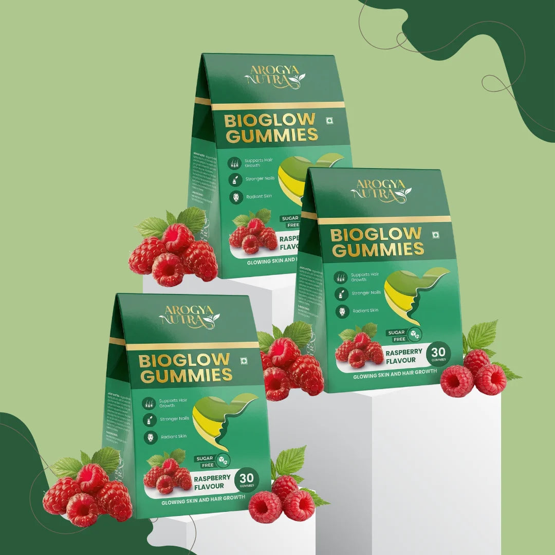 Three boxes of Bioglow Gummies with red berries on a green background