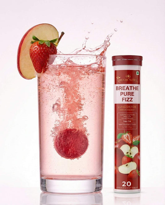 Glass of pink drink with a strawberry and apple slice, next to a 'Breathe Pure Fizz' supplement container.