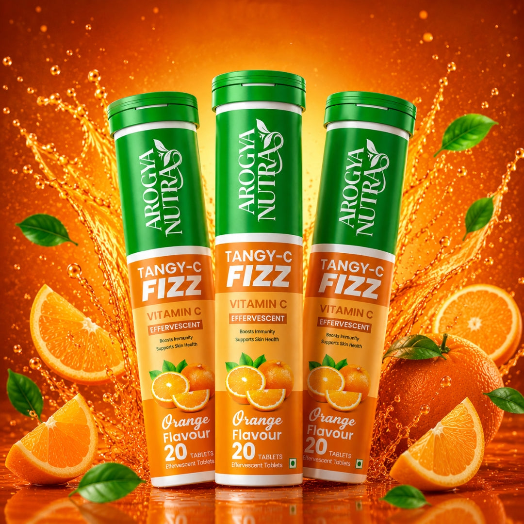 Three bottles of Tangy-C Fizz Vitamin C supplement on a peach background