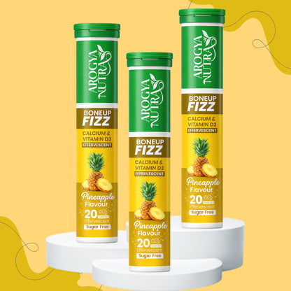 Three bottles of BoneUp Fizz with pineapple flavor on a yellow background