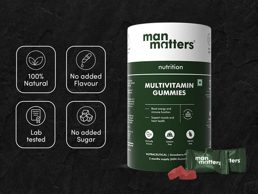 Man Matters Multivitamin Gummies packaging on a dark background